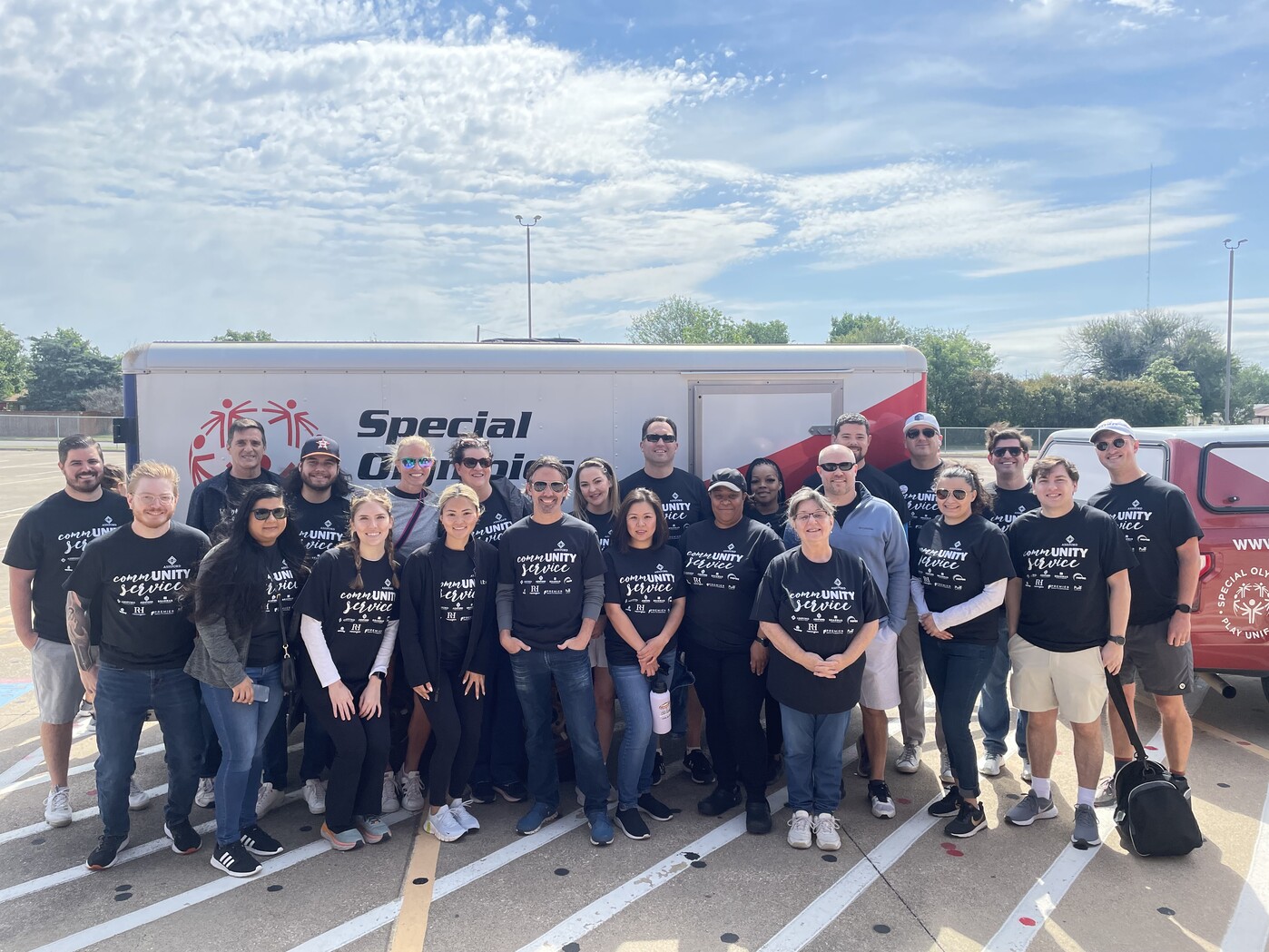 Team Members In Red Shirts